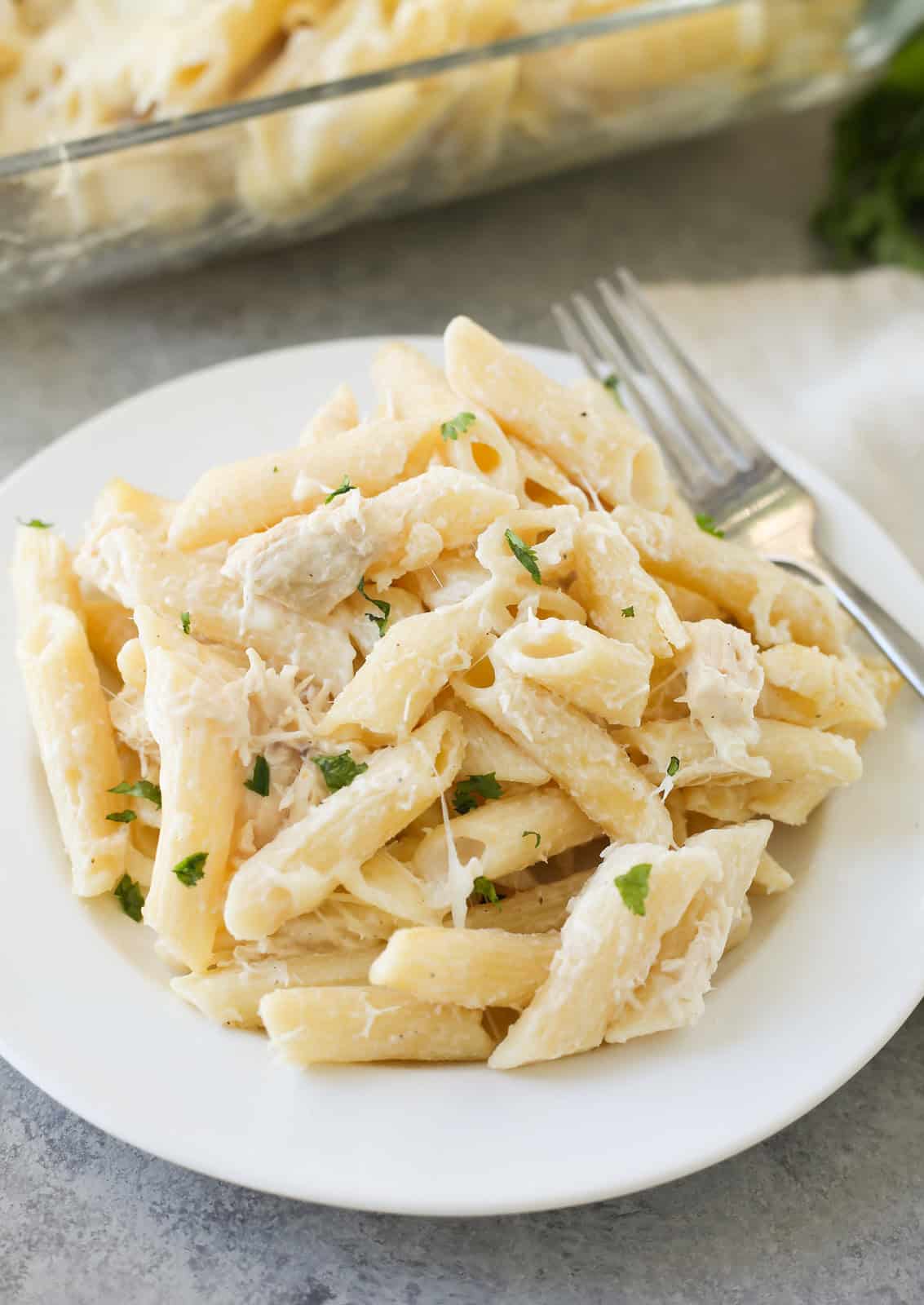 Chicken alfredo bake on a white plate 